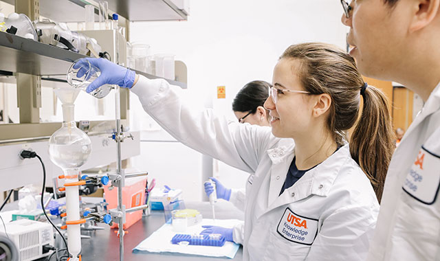 students working in a scientific lab