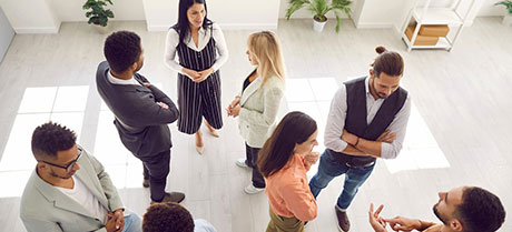 Group of people standing and talking