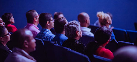 Crowd of people listening to a seminar